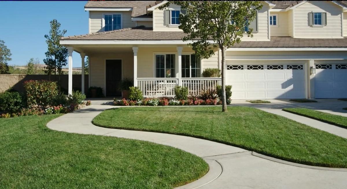 Freshly mowed front lawn with clean edges along the walk